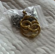 řetízek Nekonečný příběh - zlatý amulet Auryn